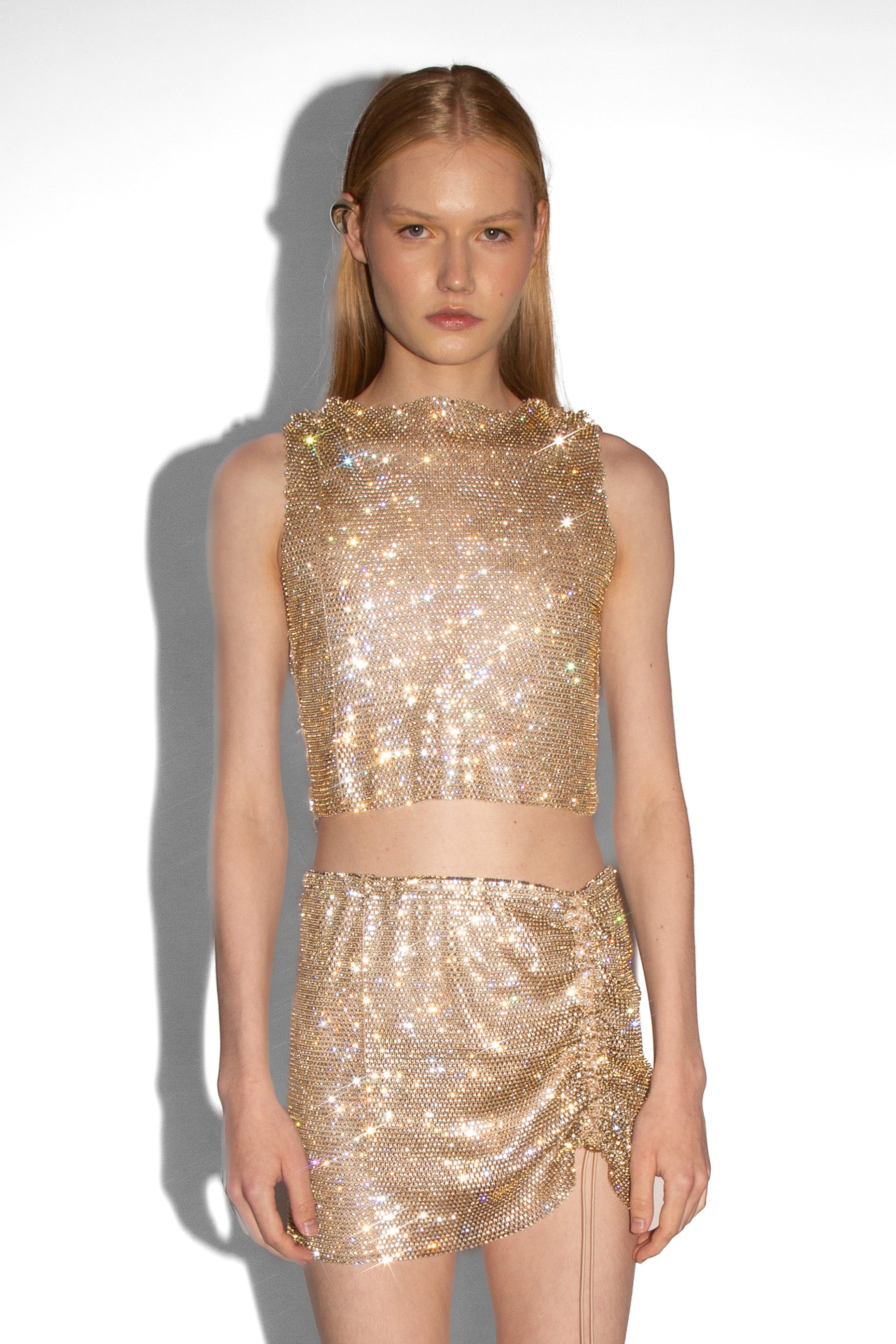 Crystal Embellished Fishnet Mini Skirt in Gold